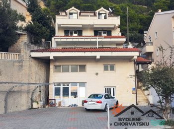 Apartmánový dům s garáží v první řadě 